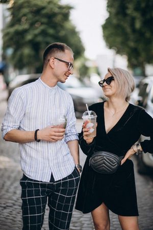 Couple enjoying a relaxed conversation during a city date